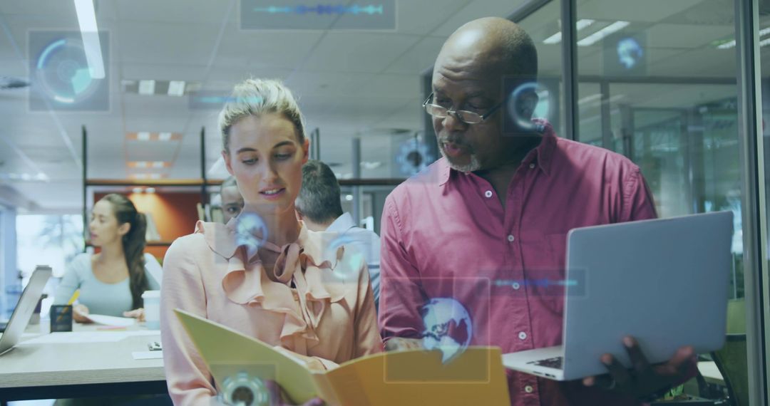 Business Team Analyzing Documents in Modern Office with Technology