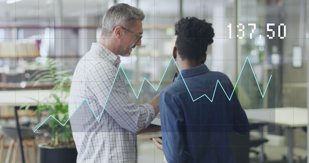 Business Colleagues Analyzing Data With Graph Overlay