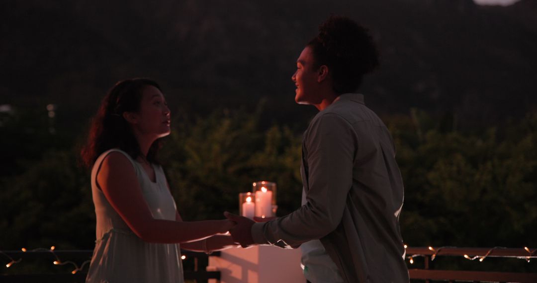 Romantic Proposal at Night with Holding Hands and Candlelight