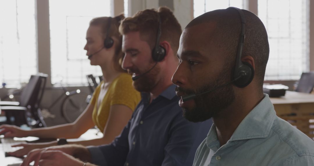 Customer Service Team Using Headsets at Call Center - Free Images, Stock Photos and Pictures on Pikwizard.com