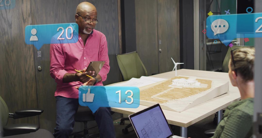 Architect Discussing Construction Model During Team Meeting