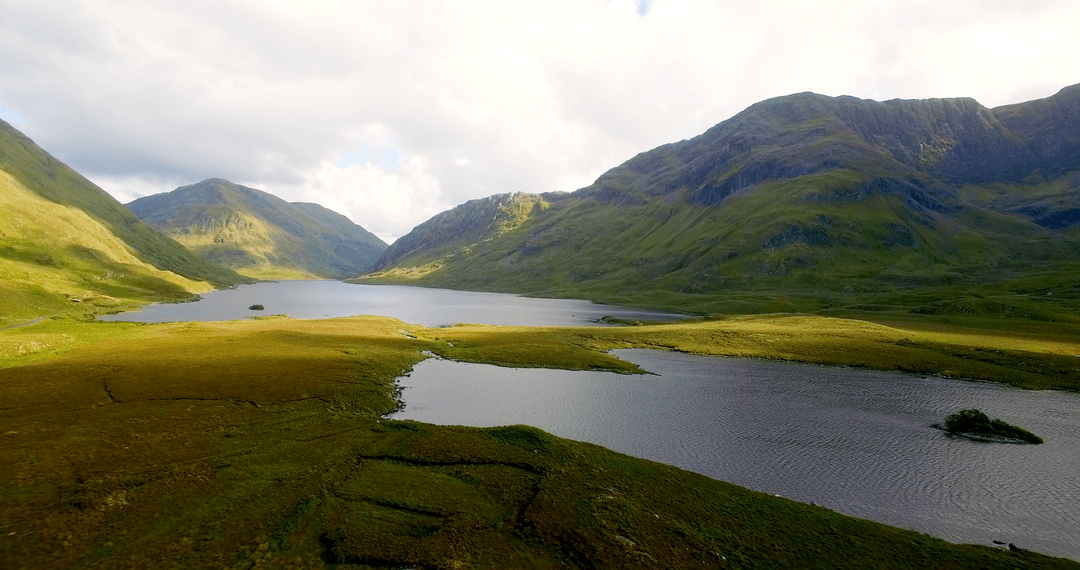Transparent Lake with Tranquil Mountain View