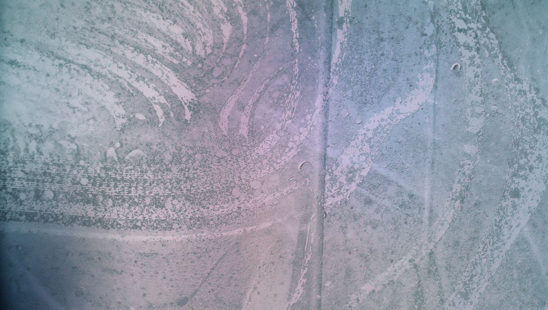 Swirling Soap Foam on Glass with Cleaning Patterns