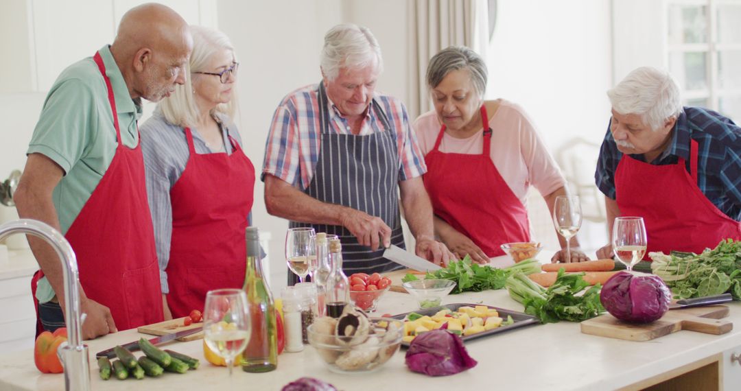 Group of Senior Adults Preparing Meal Together - Free Images, Stock Photos and Pictures on Pikwizard.com