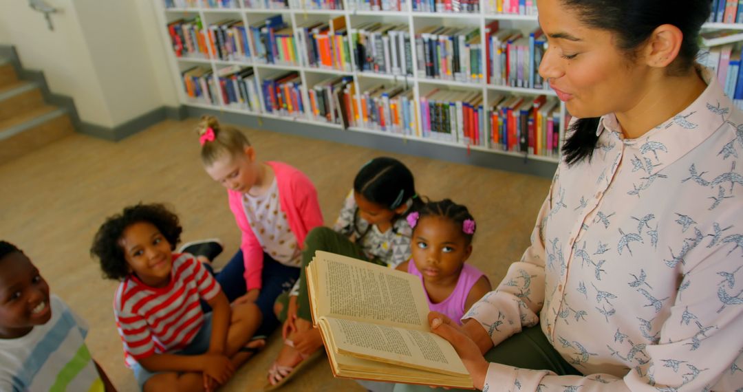 Teacher Guiding Young Students in a Library Storytime