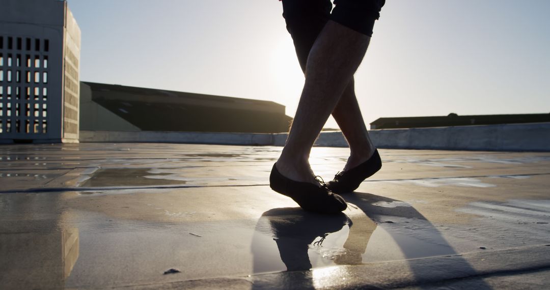 Dancer's Feet on Rooftop at Sunset - Free Images, Stock Photos and Pictures on Pikwizard.com