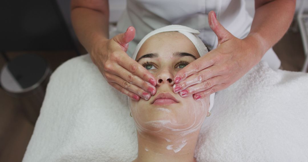 Woman Enjoying Relaxing Facial Treatment in Spa - Free Images, Stock Photos and Pictures on Pikwizard.com