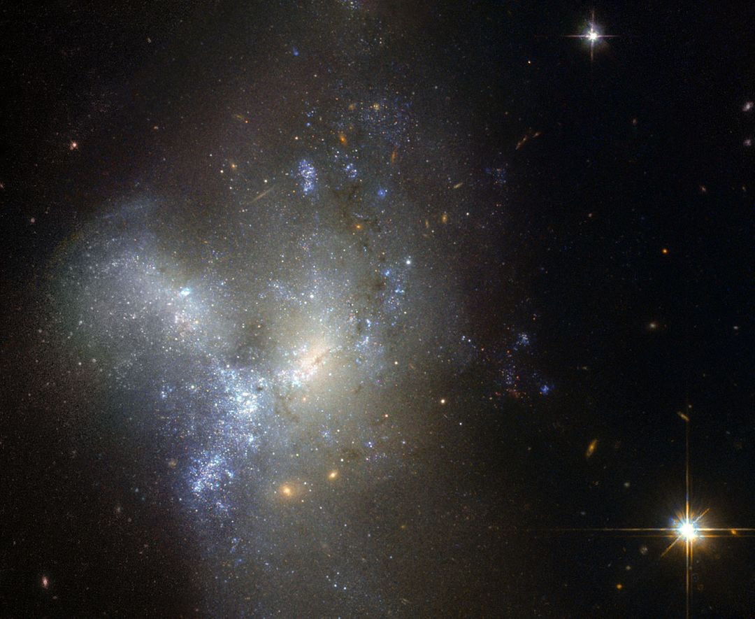 30 Million light-years Away Hubble Sees Merging Galaxies - Free Images, Stock Photos and Pictures on Pikwizard.com