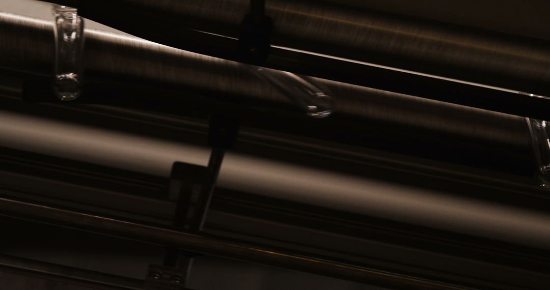 Close-up of Stainless Steel Industrial Pipelines in Dark Setting - Free Images, Stock Photos and Pictures on Pikwizard.com