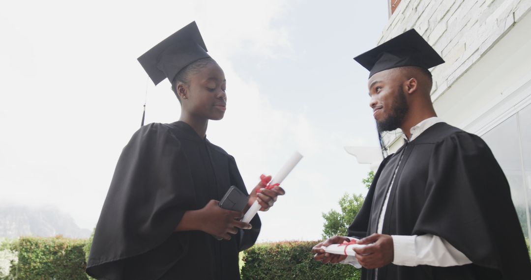 Graduates Celebrating Academic Achievement Outdoors