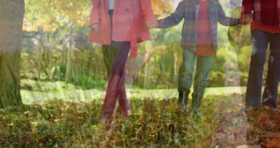 Family Enjoying Autumn Walk in Lush Park Setting