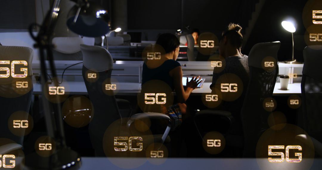 Innovative Team Collaborating on 5G Technology in Office