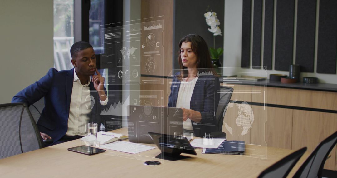 Business Professionals Reviewing Data Projections in Modern Office