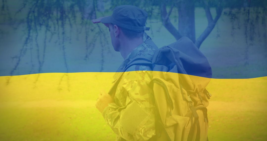 Ukrainian Soldier Overlaid with National Flag in Nature - Free Images, Stock Photos and Pictures on Pikwizard.com