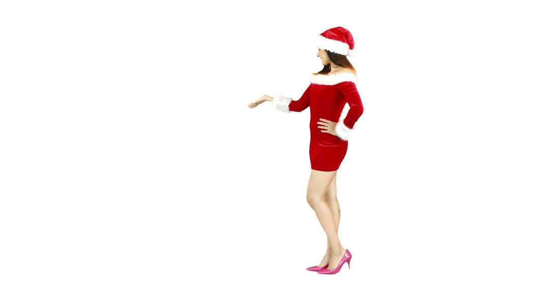 Woman Wearing Red Santa Dress and Hat Gesturing - Free Images, Stock Photos and Pictures on Pikwizard.com