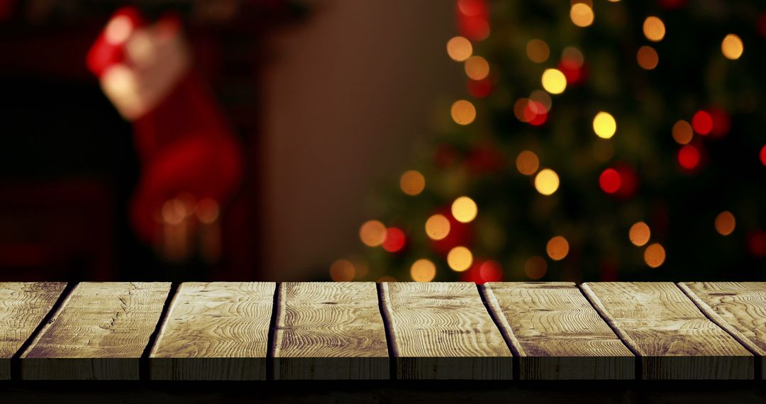 Wooden Table in Cozy Christmas Setting with Blurred Tree Lights