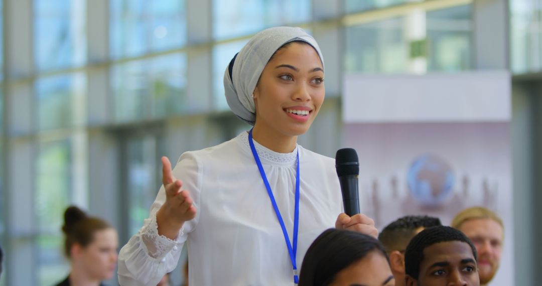 Confident Asian Businesswoman Speaking at Seminar