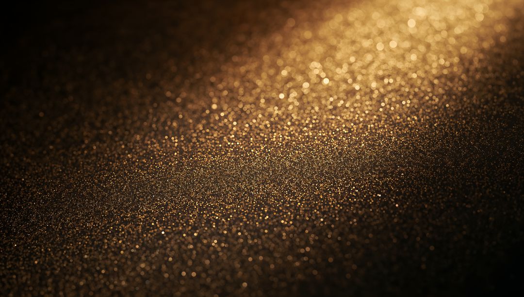 Shimmering Gold Glitter Texture Catching Warm Light with Bokeh Sparkle and Metallic Sheen