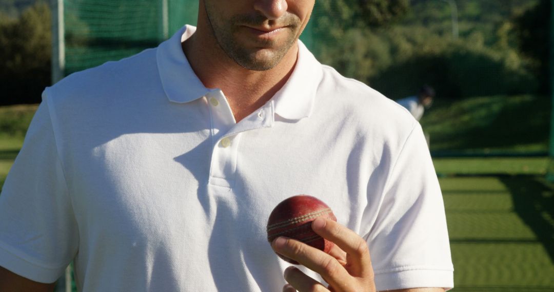 Cricket Player Focusing on Ball During Training Session