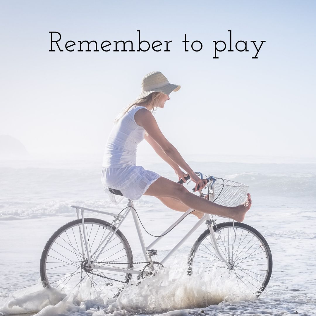 Woman Riding Bicycle on Beach Embraces Freedom