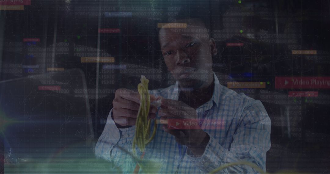 African American Male Technician Fixing Network Wires in Data Center - Free Images, Stock Photos and Pictures on Pikwizard.com