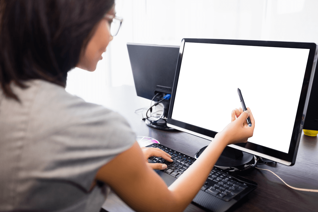 Professional Woman Working on Computer with Digital Pen and Transparent Screen