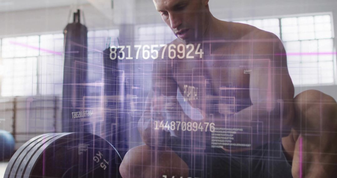 Athlete Analyzing Biometrics During Workout in Modern Gym