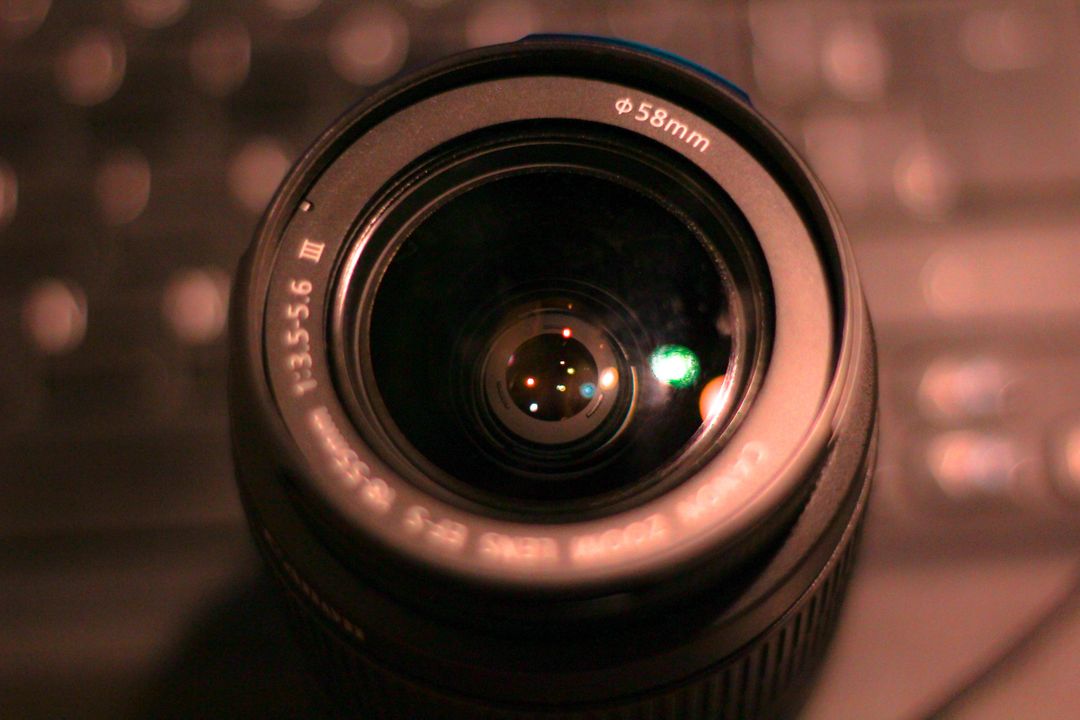 Close-Up of Camera Lens with 58mm Filter in Dim Lighting - Free Images, Stock Photos and Pictures on Pikwizard.com