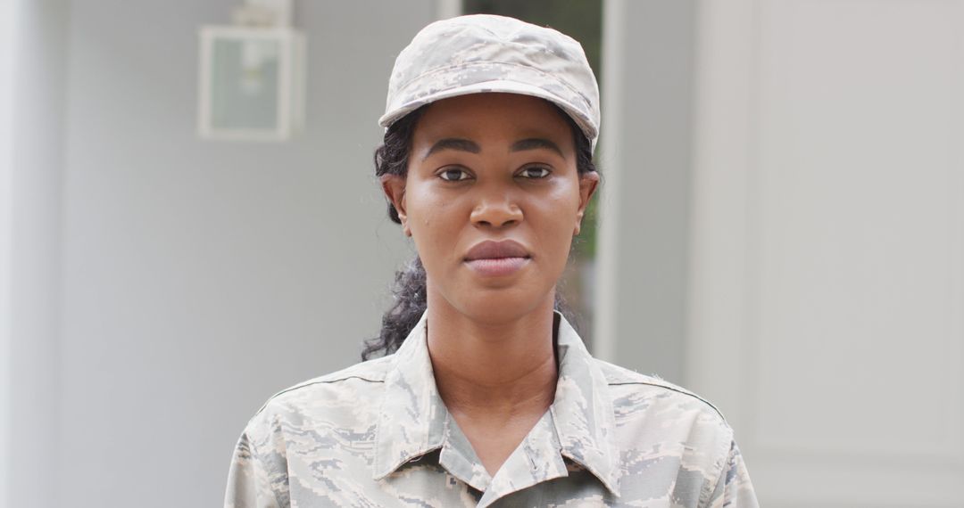 Female Soldier in Uniform Standing Outdoors with Serious Expression - Free Images, Stock Photos and Pictures on Pikwizard.com