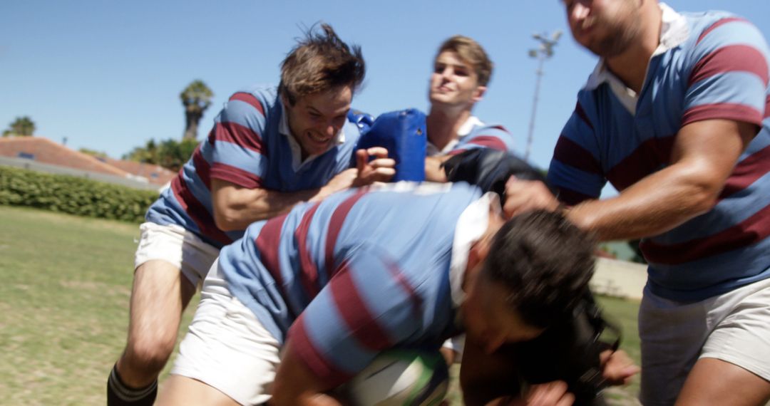 Rugby Players Tackling on Field During Match - Free Images, Stock Photos and Pictures on Pikwizard.com