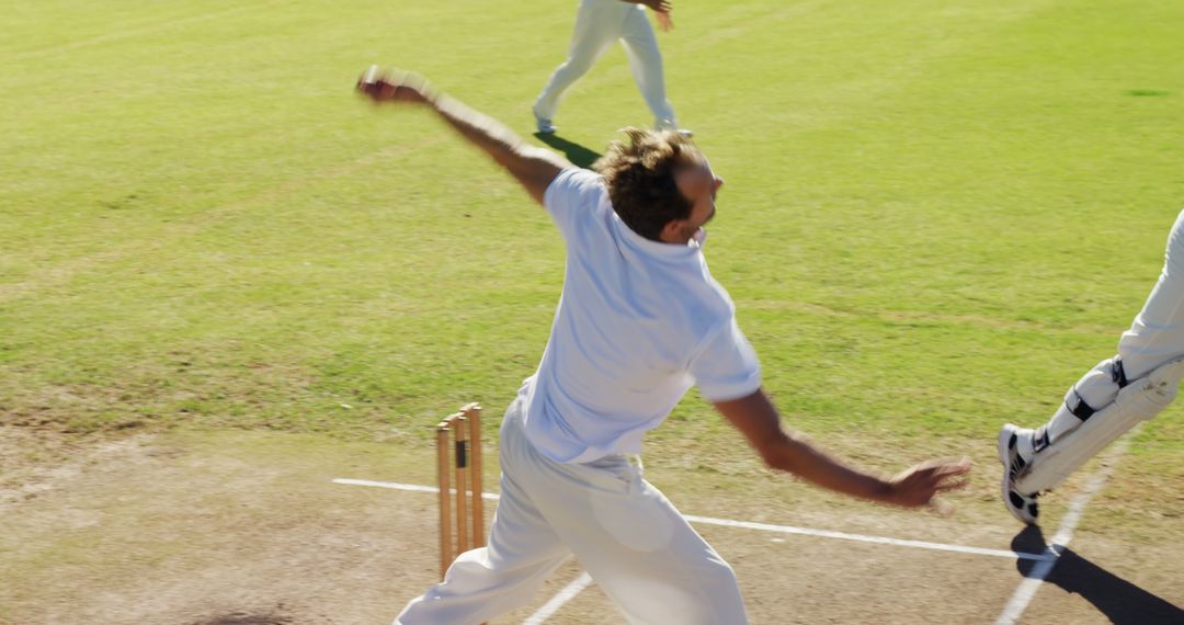 Cricket Bowler in Action During Match - Free Images, Stock Photos and Pictures on Pikwizard.com