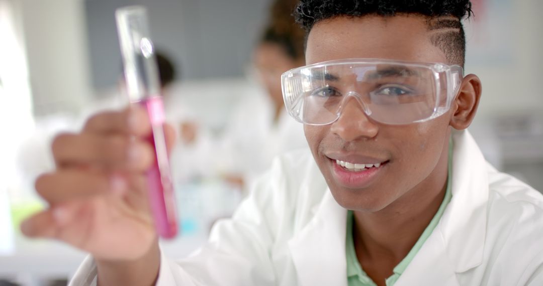 Enthusiastic Teen Scientist Experimenting in High School Laboratory