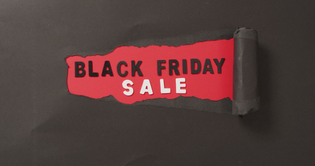 Black Friday Sale Display on Ripped Red Paper Background - Free Images, Stock Photos and Pictures on Pikwizard.com