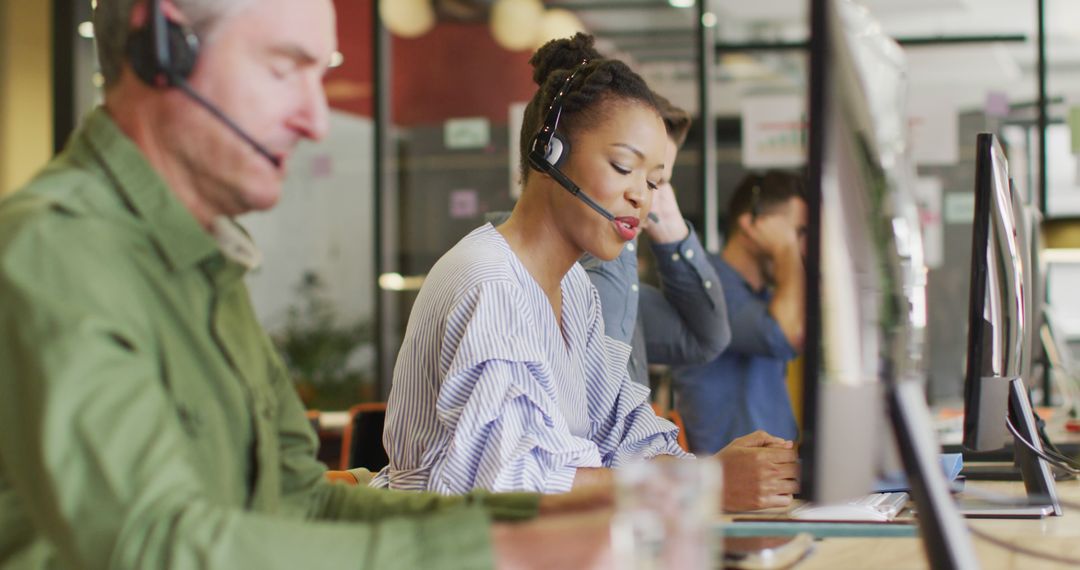 Customer Support Team Using Headsets in Modern Office - Free Images, Stock Photos and Pictures on Pikwizard.com