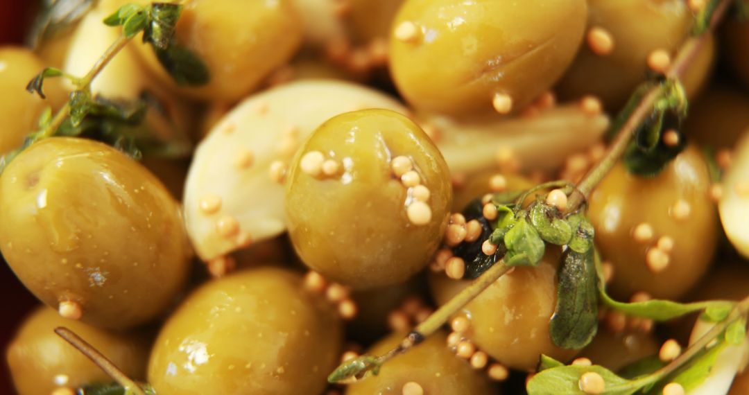 Close-Up of Marinated Green Olives with Herbs and Spices - Free Images, Stock Photos and Pictures on Pikwizard.com