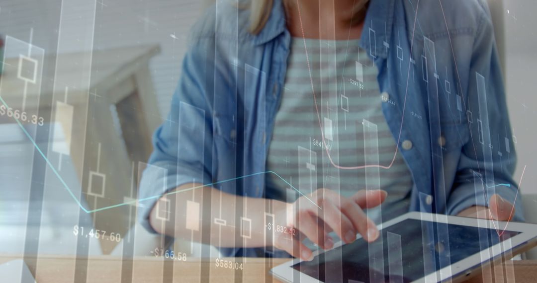 Woman Analyzing Financial Data on Tablet with Graph Overlays - Free Images, Stock Photos and Pictures on Pikwizard.com