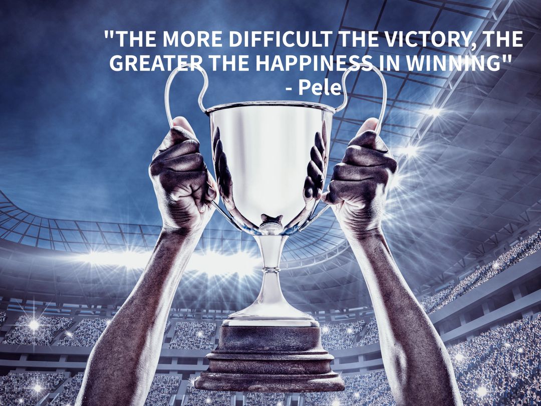 Champion's Celebration with Trophy in Hand at Stadium