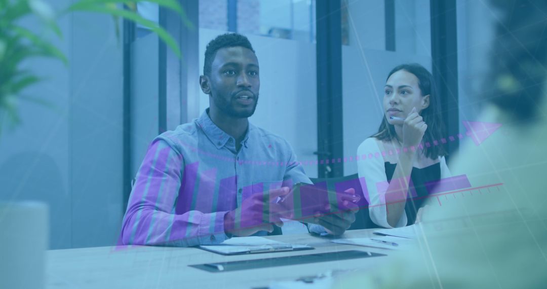 Diverse Business Team Discussing Corporate Trends in Office Meeting