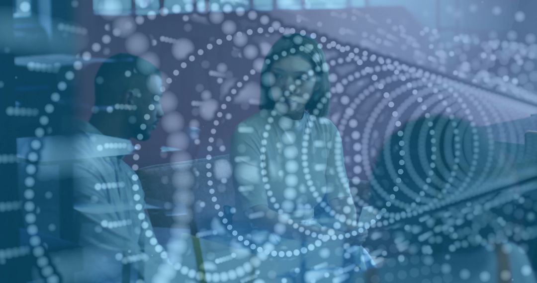 Colleagues Discussing Strategy with Data Visualization in Modern Office