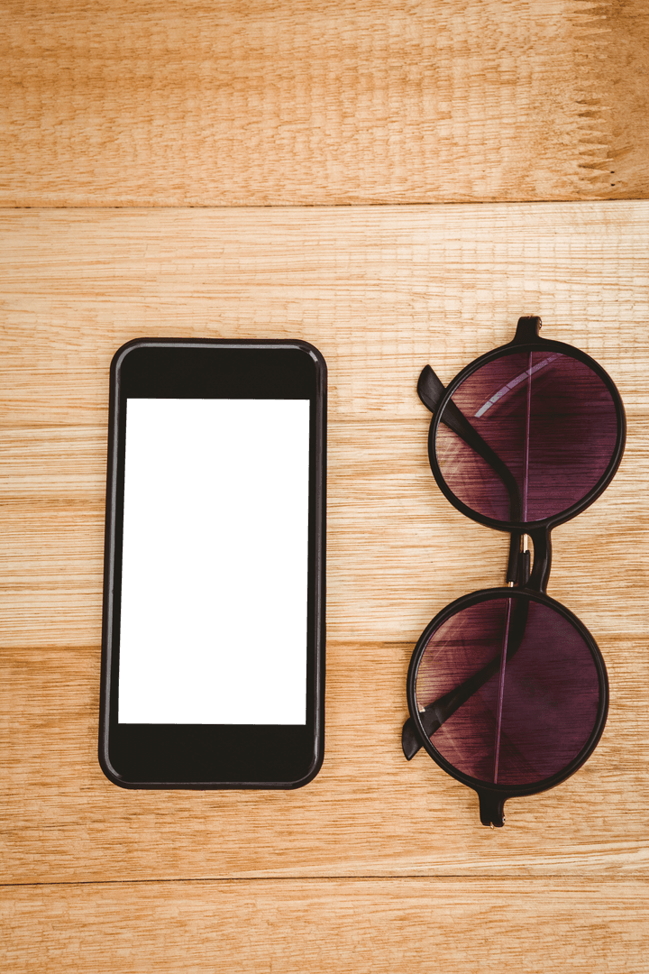 Transparent Smartphone and Sunglasses on Wooden Surface