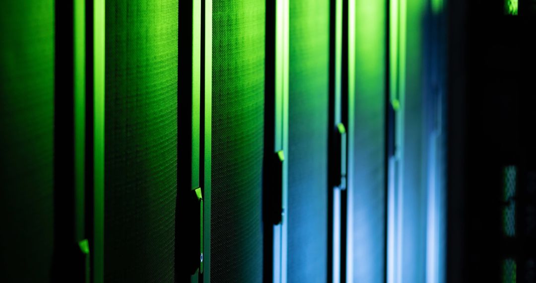 Illuminated Data Servers with Green and Blue Lighting in Data Center