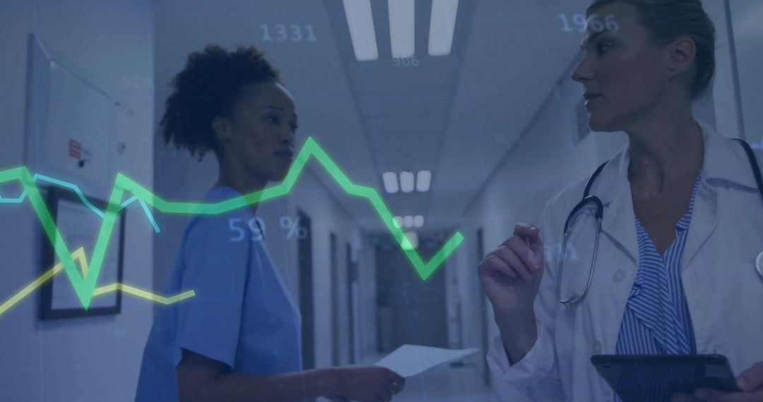 Doctor and Nurse Analyzing Graph Data in Hospital Corridor