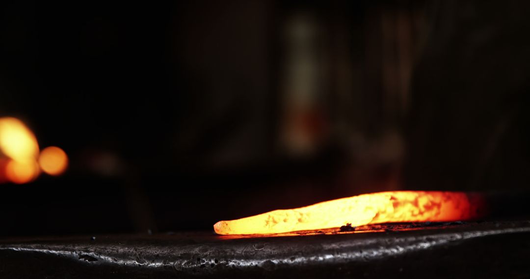 Heated Metal Bar on Anvil in Low Light Blacksmith Workshop - Free Images, Stock Photos and Pictures on Pikwizard.com