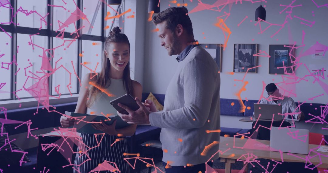 Team Collaboration with Digital Tablet in Coworking Space