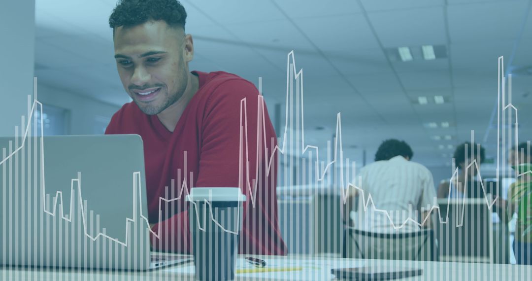 Smiling Entrepreneur Analyzing Market Data on Laptop with Graph Overlay