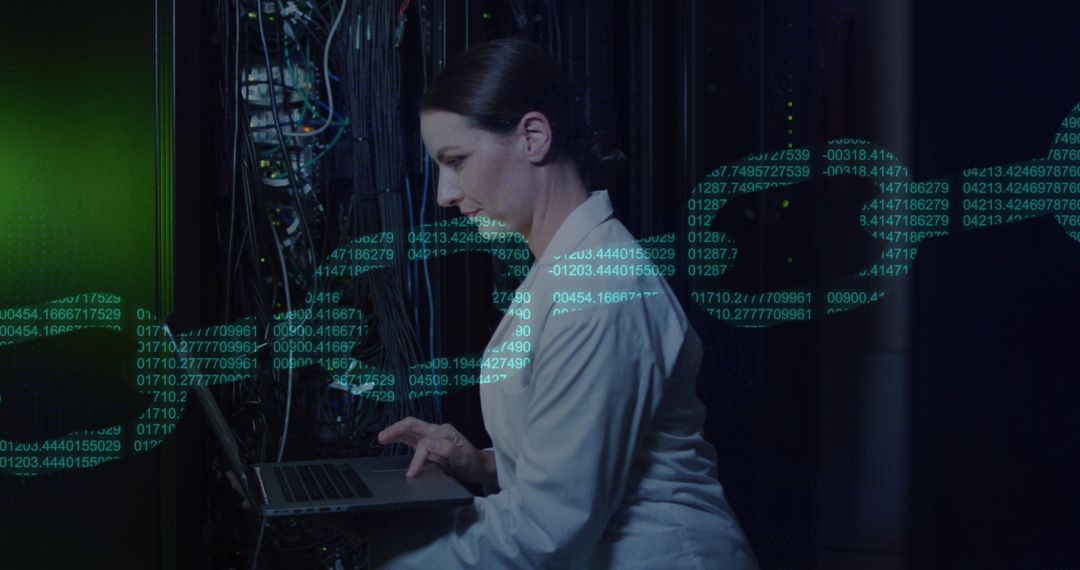 IT Engineer Managing Cybersecurity in Data Center with Server Racks - Free Images, Stock Photos and Pictures on Pikwizard.com