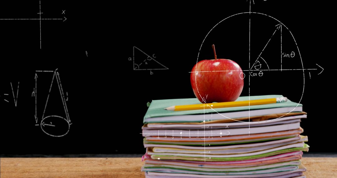 Apple and Notebooks with Math Equations Symbolizing Education Concept