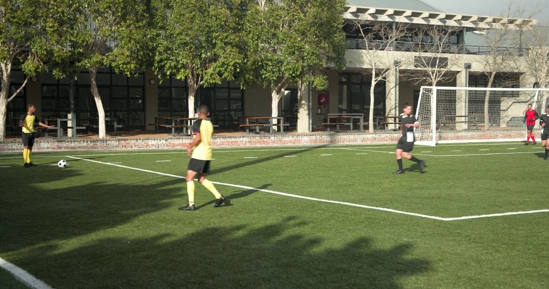 Soccer Players Practicing for Match on Sunny Day