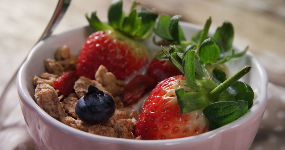 Delicious Healthy Breakfast with Fresh Berries and Granola - Free Images, Stock Photos and Pictures on Pikwizard.com