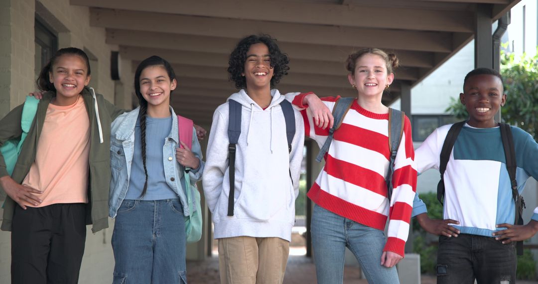 Diverse Group of Classmates Smiling on School Walkway